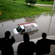 Illustration for article titled Caption this cable van flooding fail